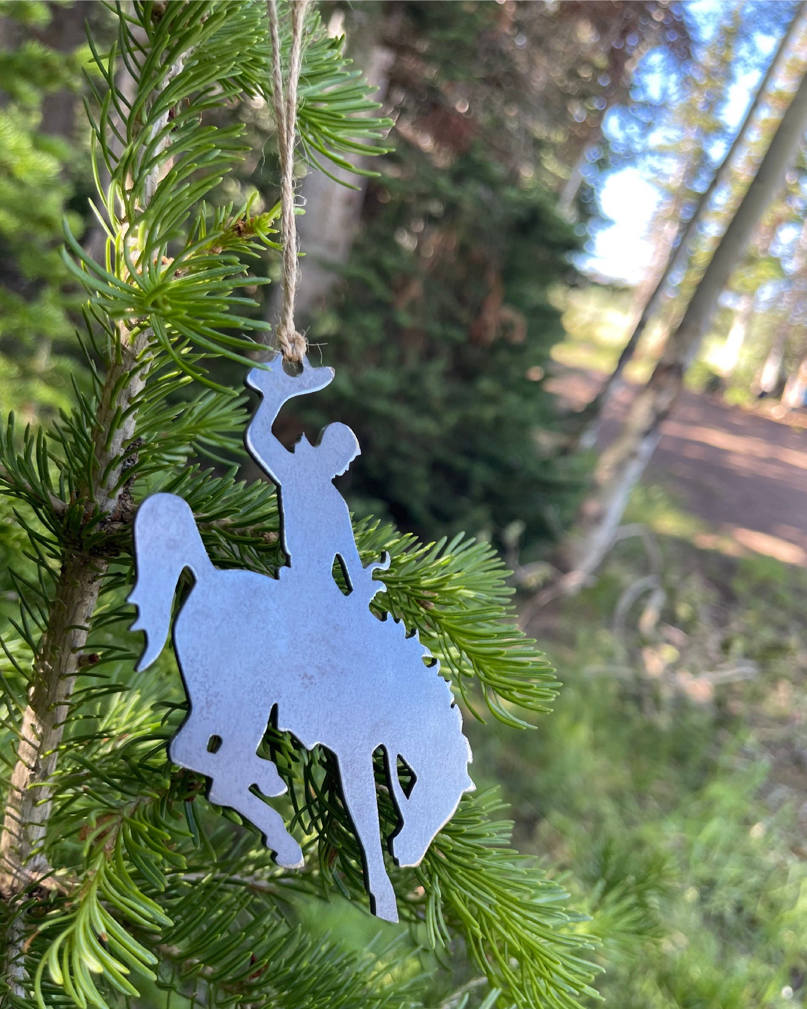 Wyoming Cowboy Bucking Bronco Raw Steel Metal Ornament