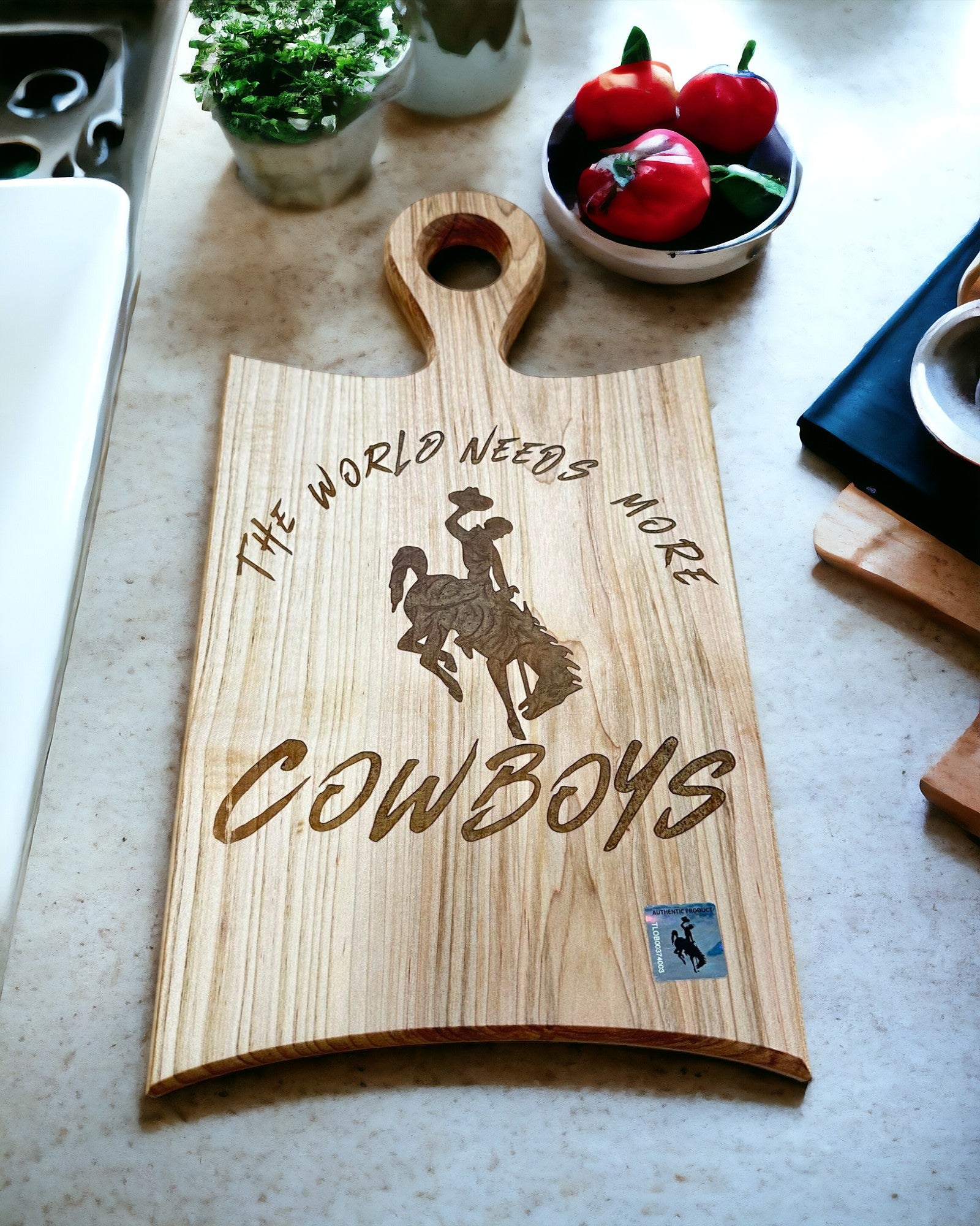 The World Needs More Cowboys Cutting Board