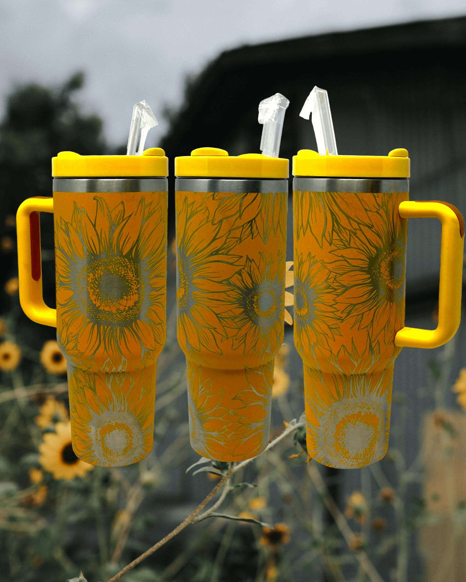 https://windriveroutpost.com/cdn/shop/files/wind_river_outpost_40_oz_stanley_dupe_sunflowers_tumbler_2.png?v=1690330121