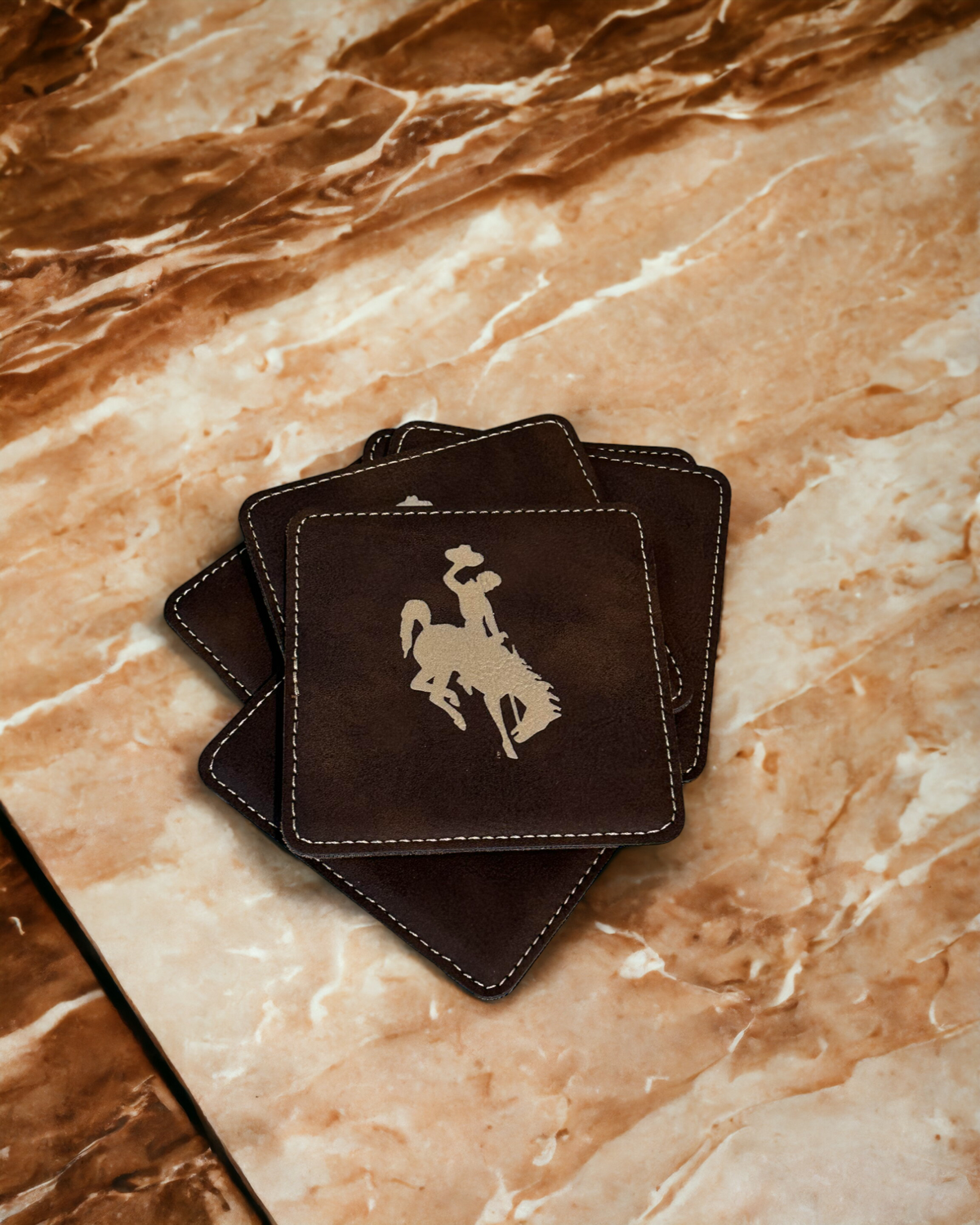 Our Wyoming Steamboat Leatherette Coasters bring an air of classic Western charm to your home!