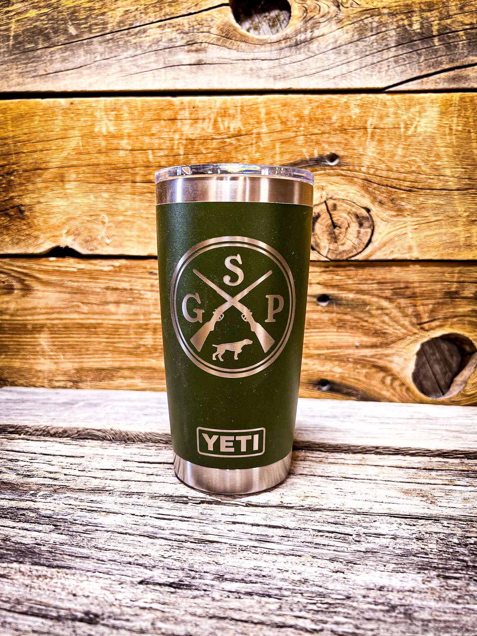 German shorthaired pointer (GSP) laser engraved artwork - silver on black Yeti Rambler tumbler on wood table with wood background