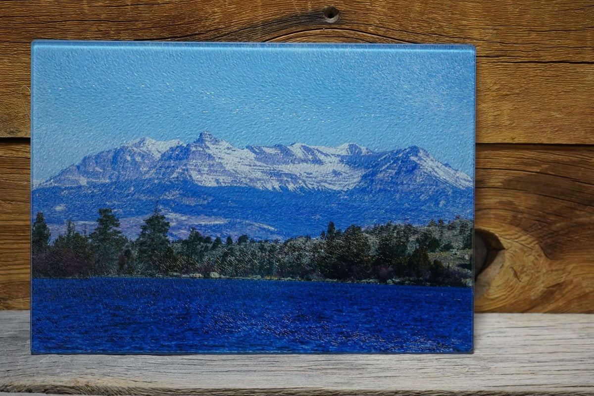 Beautiful photo of Ramshorn Peak mountain with pine trees and lake scene on glass cutting board