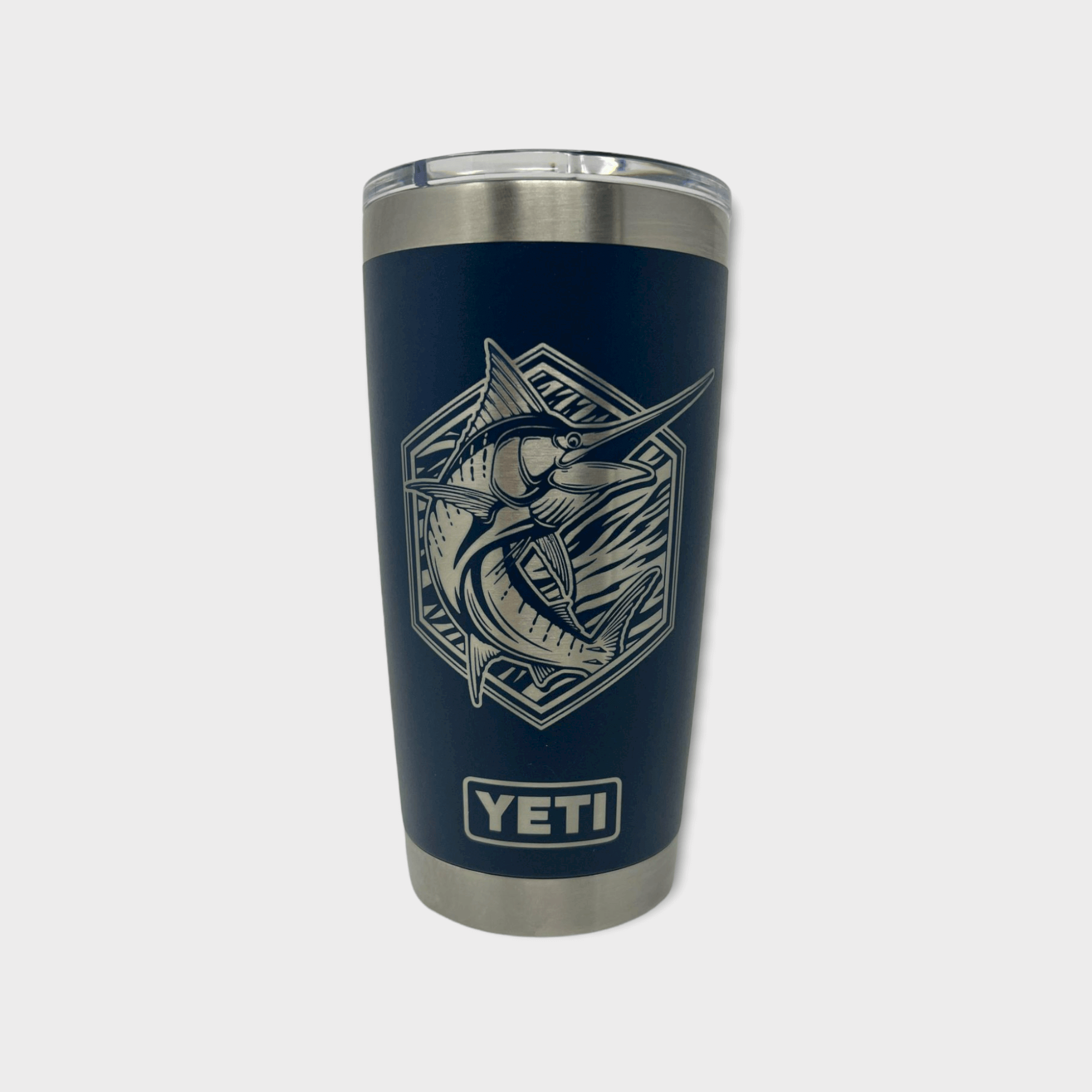 Marlin offshore fishing artwork by Joel Jensen Art laser engraved - silver on black Yeti tumbler with white background in photo.  Wind River Outpost.