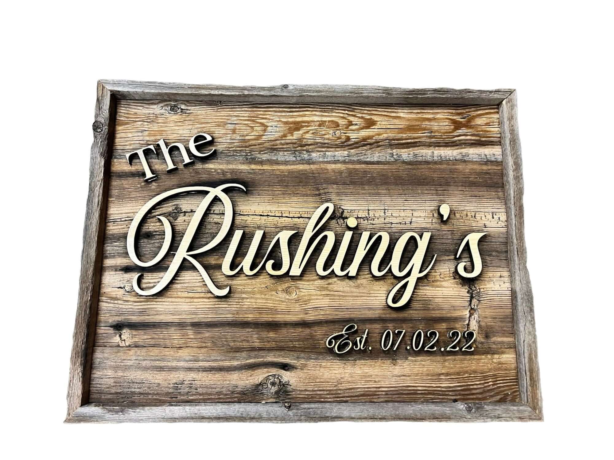A rustic 19x25 inch wedding sign, made of rustic barn wood with offset inlaid lettering of last name. Custom made to order.