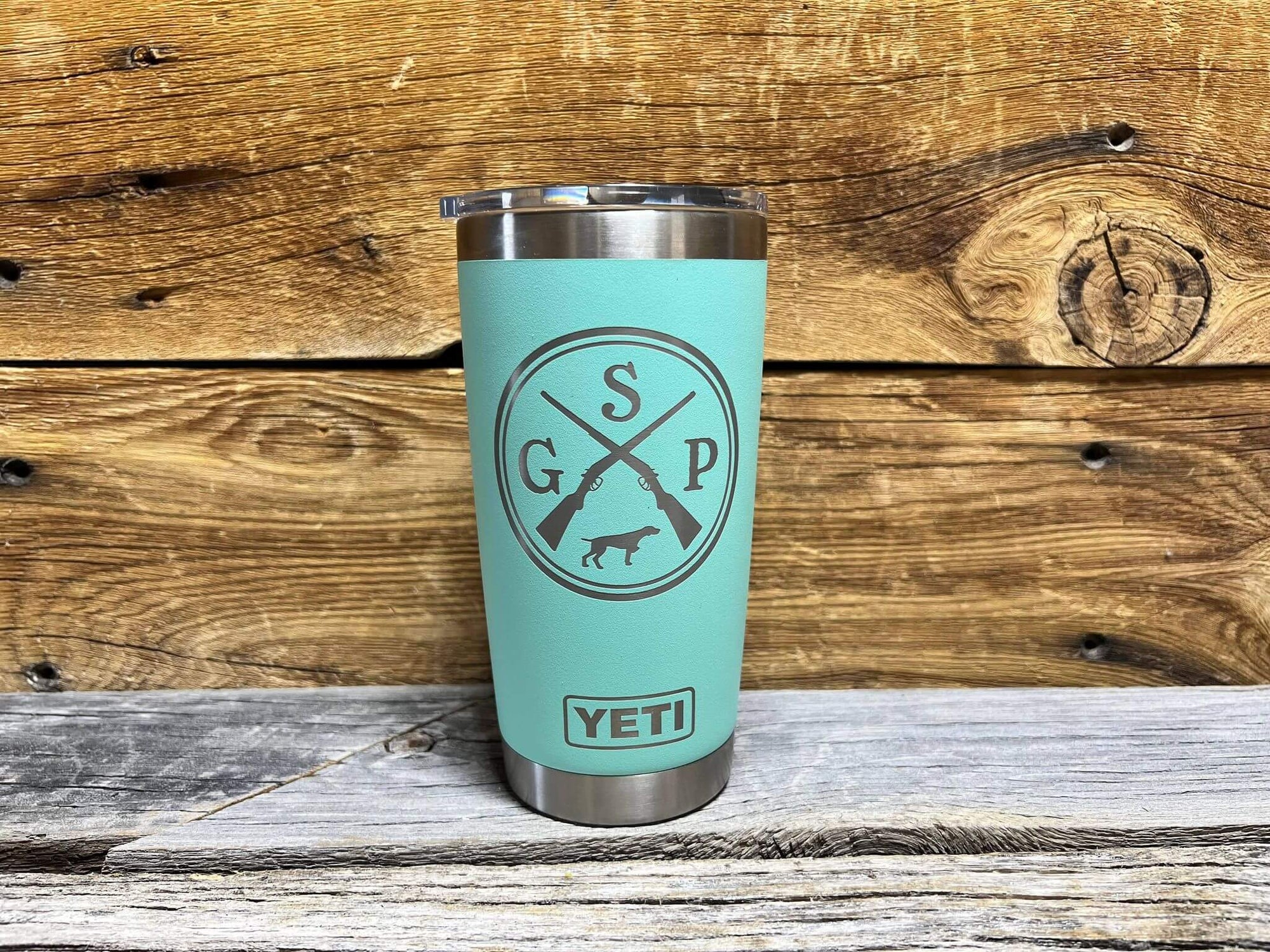 German shorthaired pointer (GSP) laser engraved artwork - silver on sea foam Yeti Rambler tumbler on wood table with wood background
