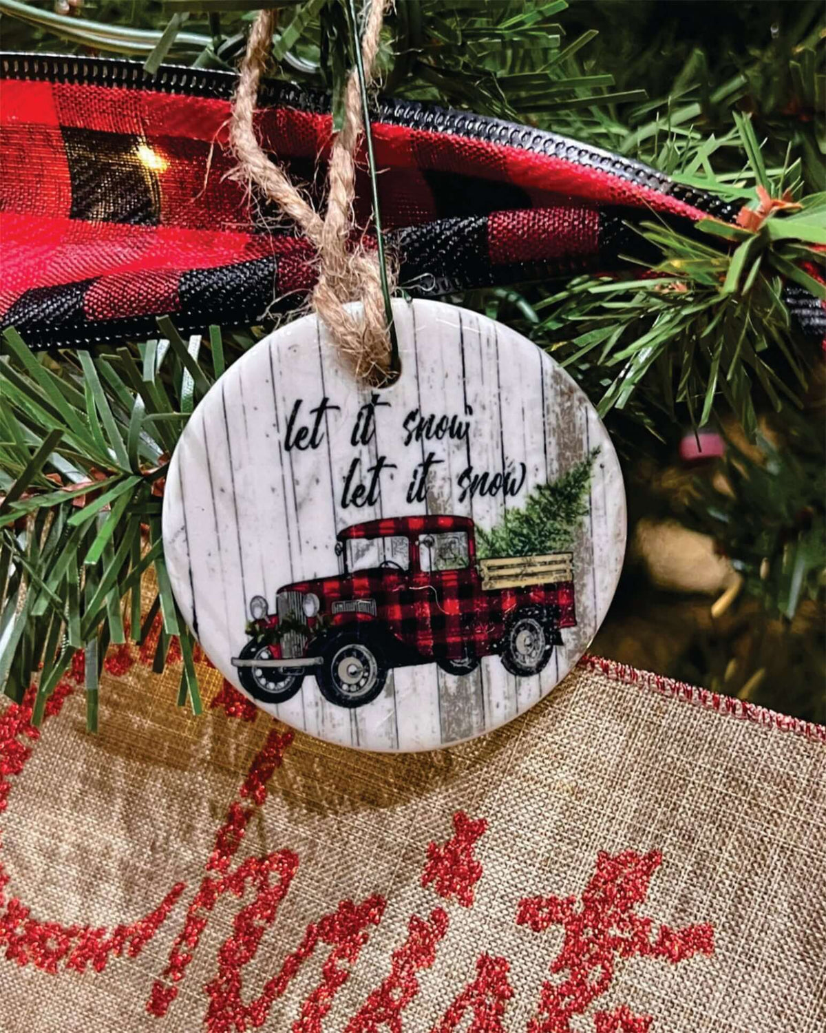 Customizable Let it Snow Ornament hanging on Christmas tree