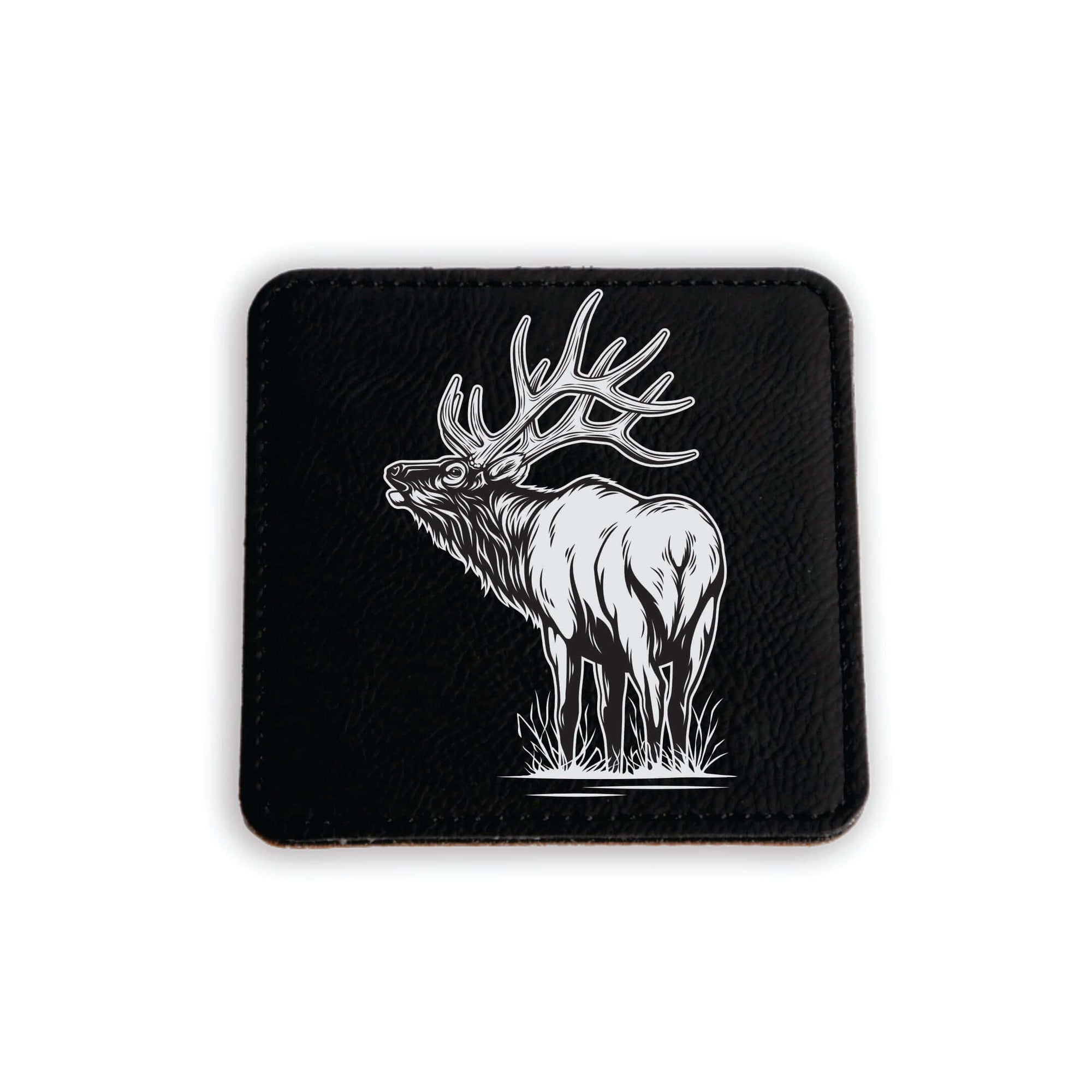 Laser engraved elk artwork on black coaster